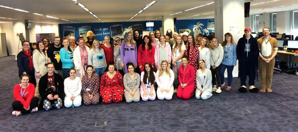 the team are wearing pyjamas for charity